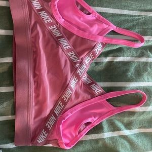 Pink Nike Dri-Fit sports bra